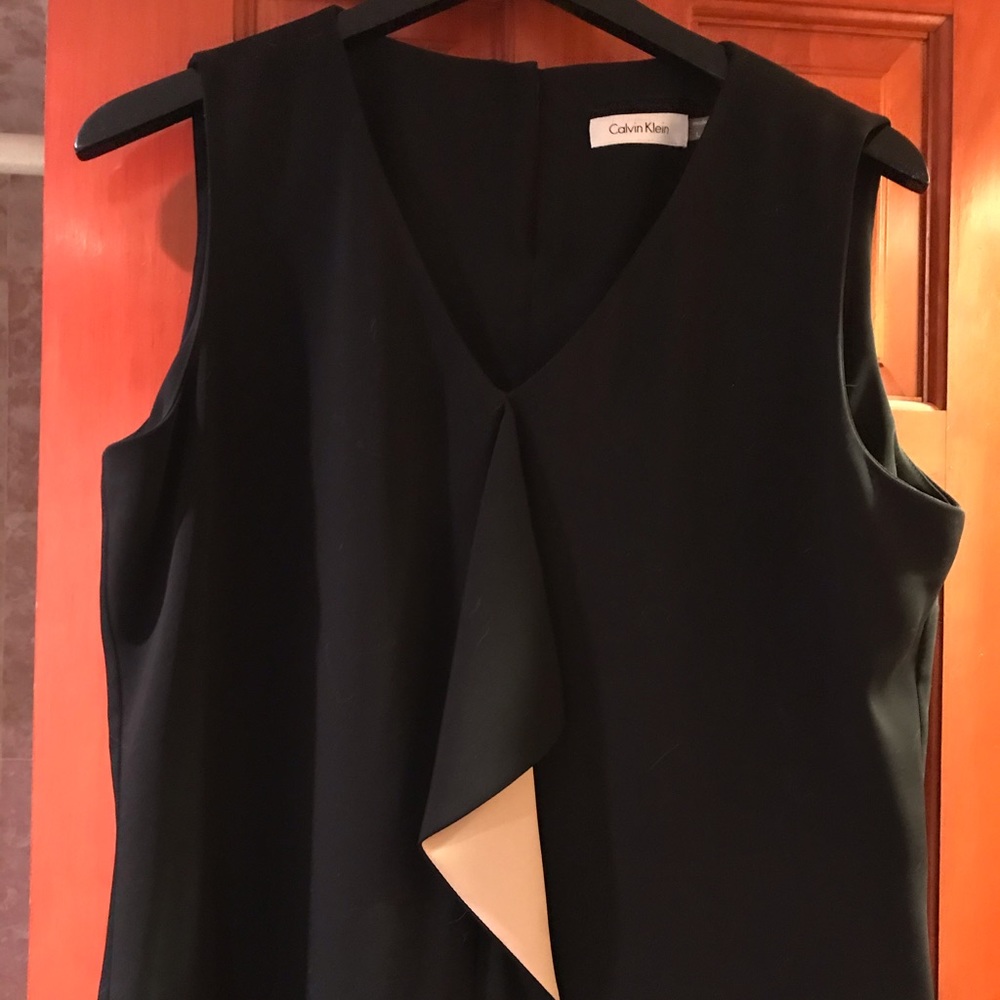 Cute sleeveless black work top